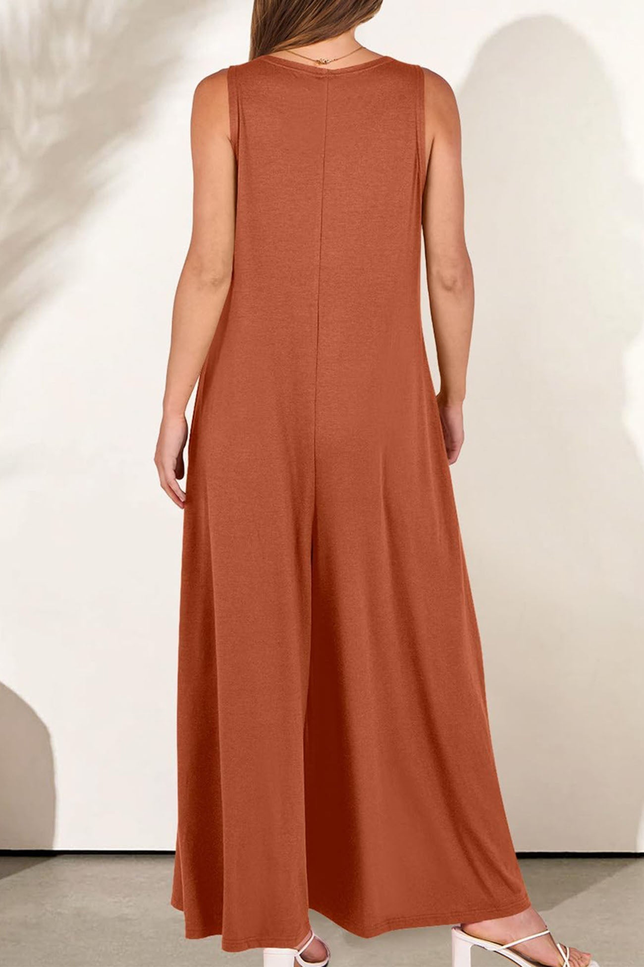 AS | Jednobarevné kombinézy s kapsami a širokými nohavicemi do V